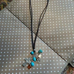 Long cross charm necklace
